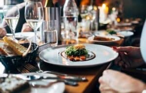 Restaurant in Philadelphia with food on the table and people eating