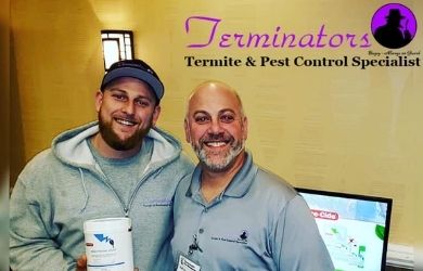 owner and son holding up diy pest control product